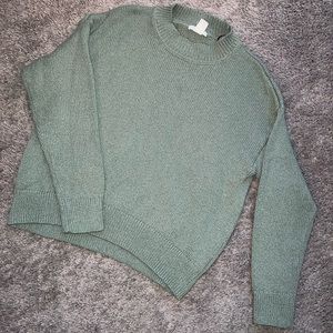 Arm green long sleeve sweater.